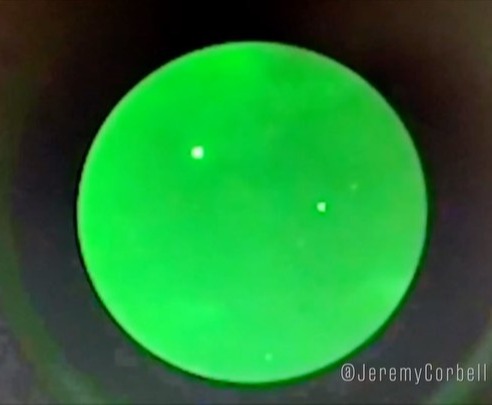 Footage captured by a US Navy destroyer shows several mysterious flashing objects
