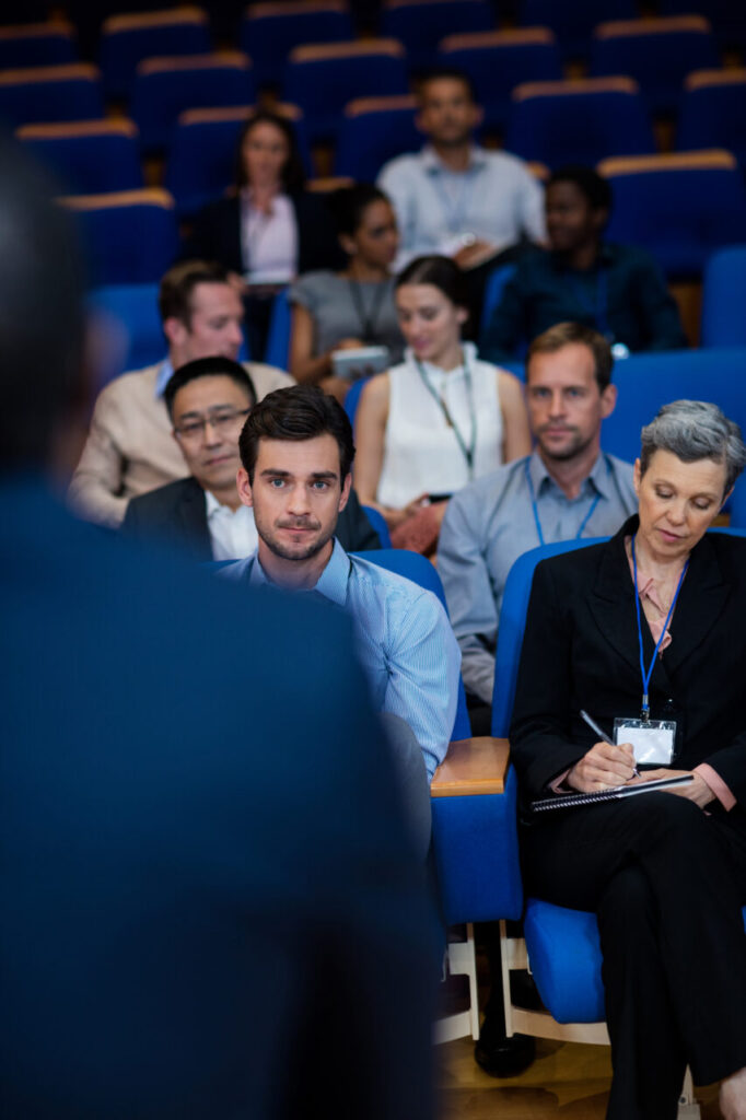 Business executives participating in a business meeting at conference center