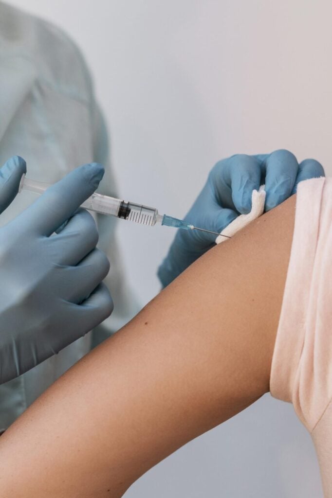 front-view-patient-getting-their-vaccine