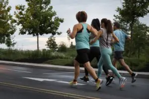 full-shot-people-running-together