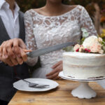 front-view-couple-cutting-cake