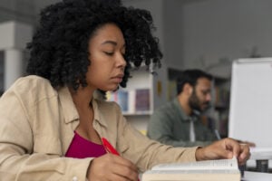 side-view-adults-studying-together