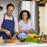 medium-shot-people-cooking-together