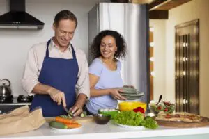 medium-shot-people-cooking-together