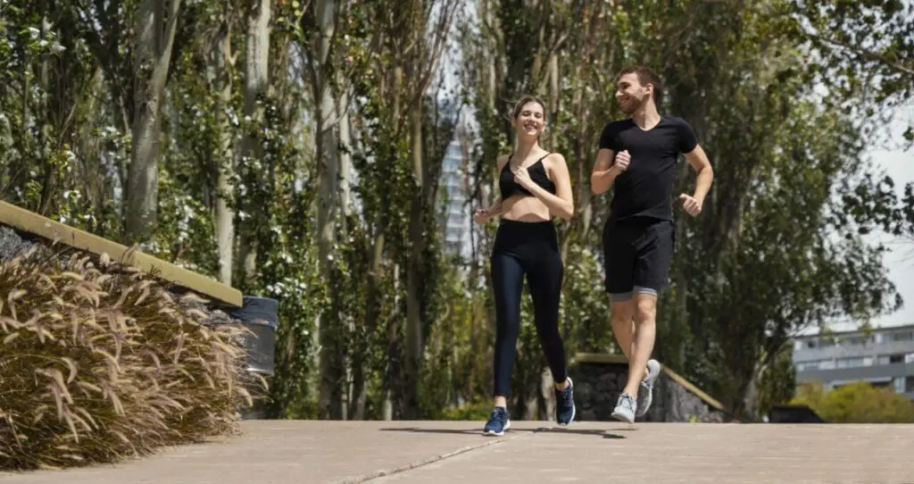 front-view-man-woman-jogging-together-outdoors