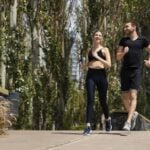 front-view-man-woman-jogging-together-outdoors