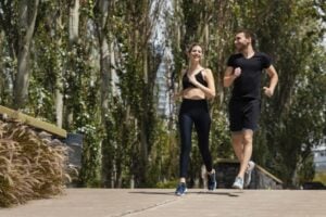 front-view-man-woman-jogging-together-outdoors