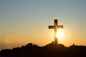 Resurrection concept:Crucifixion Of Jesus Christ Cross At Sunset