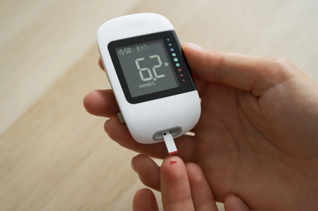 top-view-diabetic-woman-checking-her-glucose-level