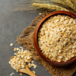 raw barley grain in old dark background
