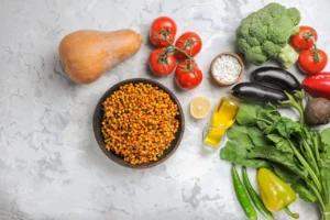 top-view-fresh-vegetables-light-white-background