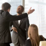 Annoyed business partners arguing during meeting
